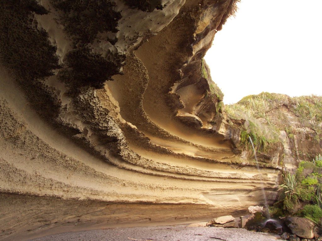 Image demonstrating impact of weathering on a cliff face.
