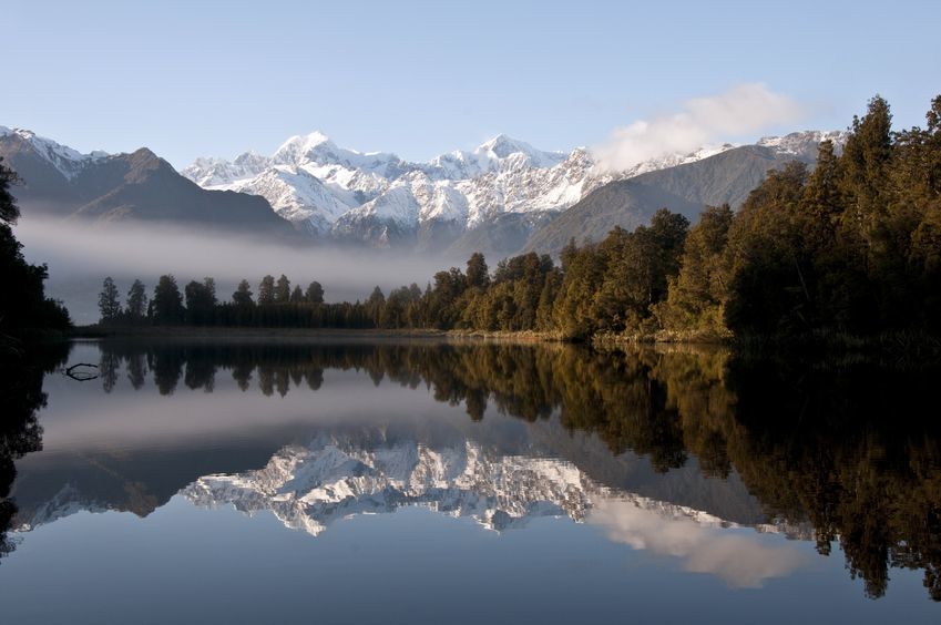 Photo of Lake Matheson shows specular reflection in the water. 