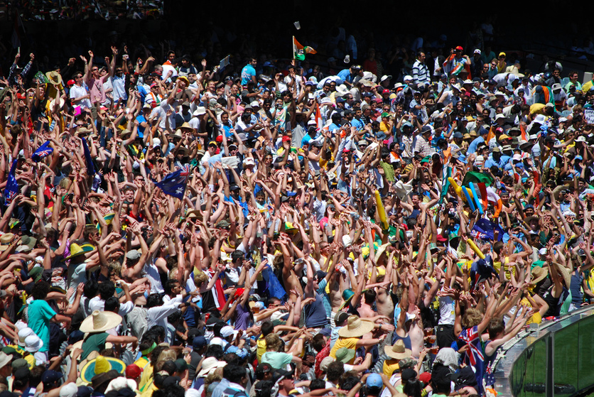 A crowd doing a Mexican wave.