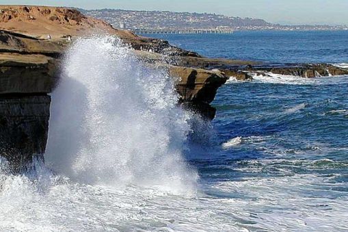 Waves bouncing off cliffs.