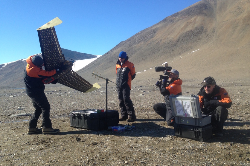 Scientists launch a drone in Antarctica’s Dry Valleys.