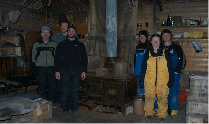 Scientists inside one of Antarctica's historic huts.