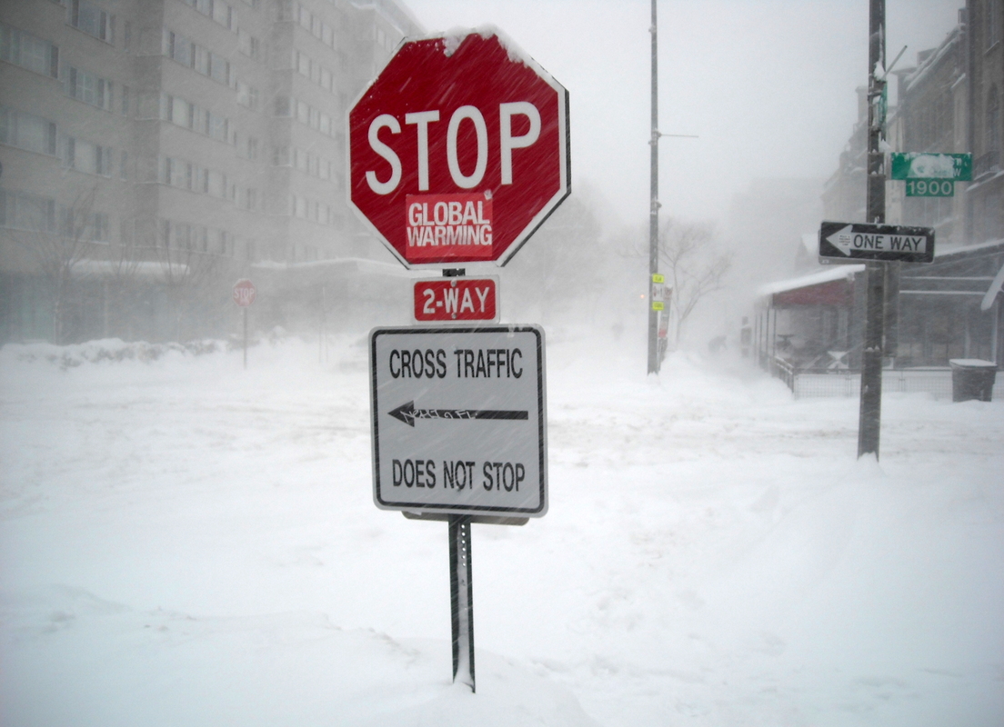 Stop sign with STOP GLOBAL WARMING Washington, DC 2010 blizzard
