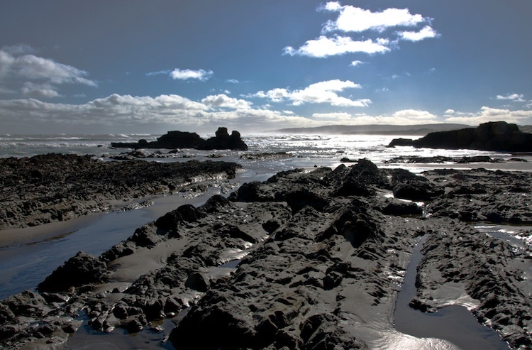 Black sands at Te Pūaha o Waikato, mouth of the Waikato river