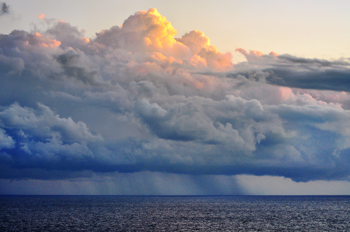Rain clouds over the sea, off the coast of Bermuda.