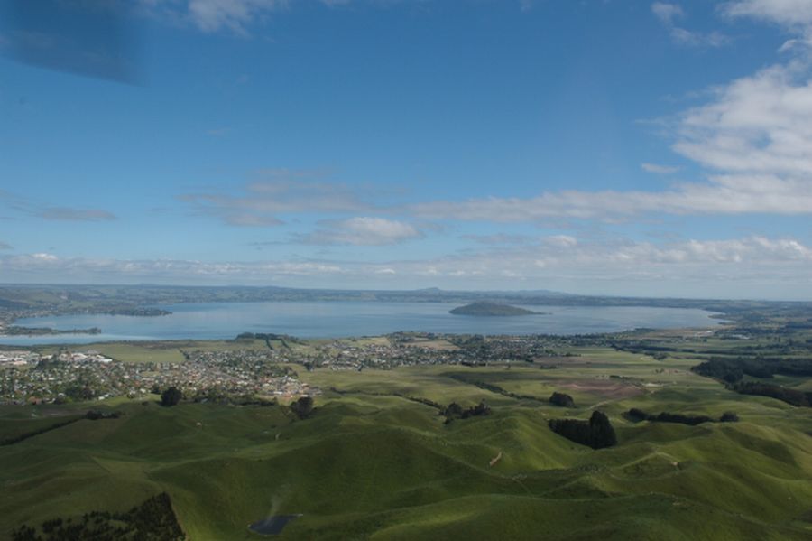 View from above of hills, town and lake of Rotorua, New Zealand.
