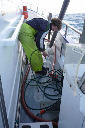 Scientist Dr Kim Currie preparing to sample seawater alkalinity