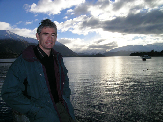 Fresh water scientist Professor David Hamilton by lake.