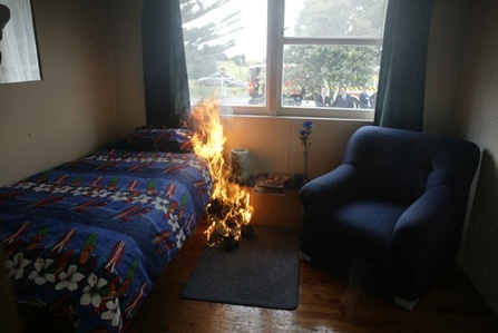 Controlled fire in a small bedroom.