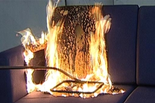 Burning combustion-modified foam in a sofa, (controlled).