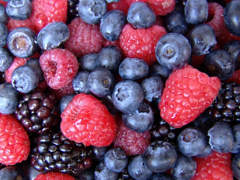 Mix of berry fruits: raspberries, blueberries and blackberries