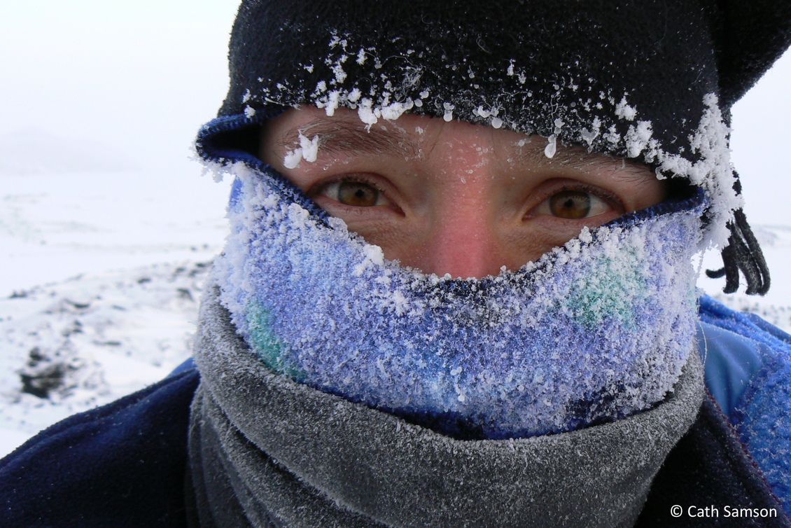Close up of Dr Katja Riedel wrapped in layers in Antarctica. 