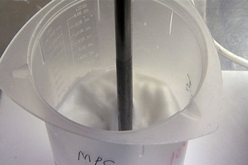 Homogenising fish oil and protein mixture in a jug