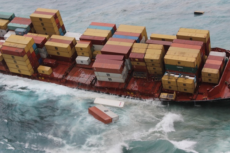 Ship Rena losing containers in rough sea after reef grounding 