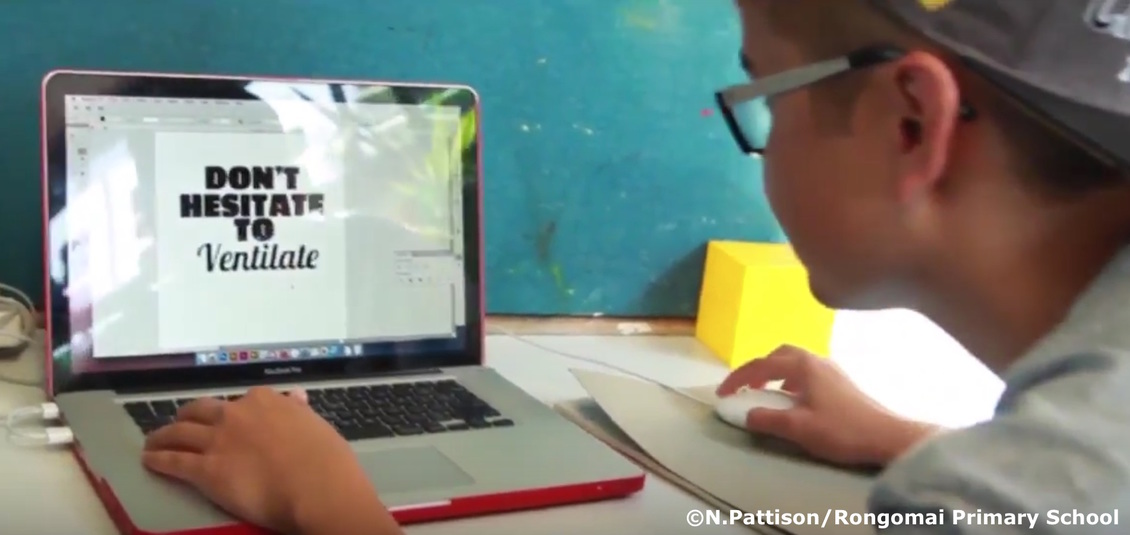 Primary school student loads data to analyse on computer.