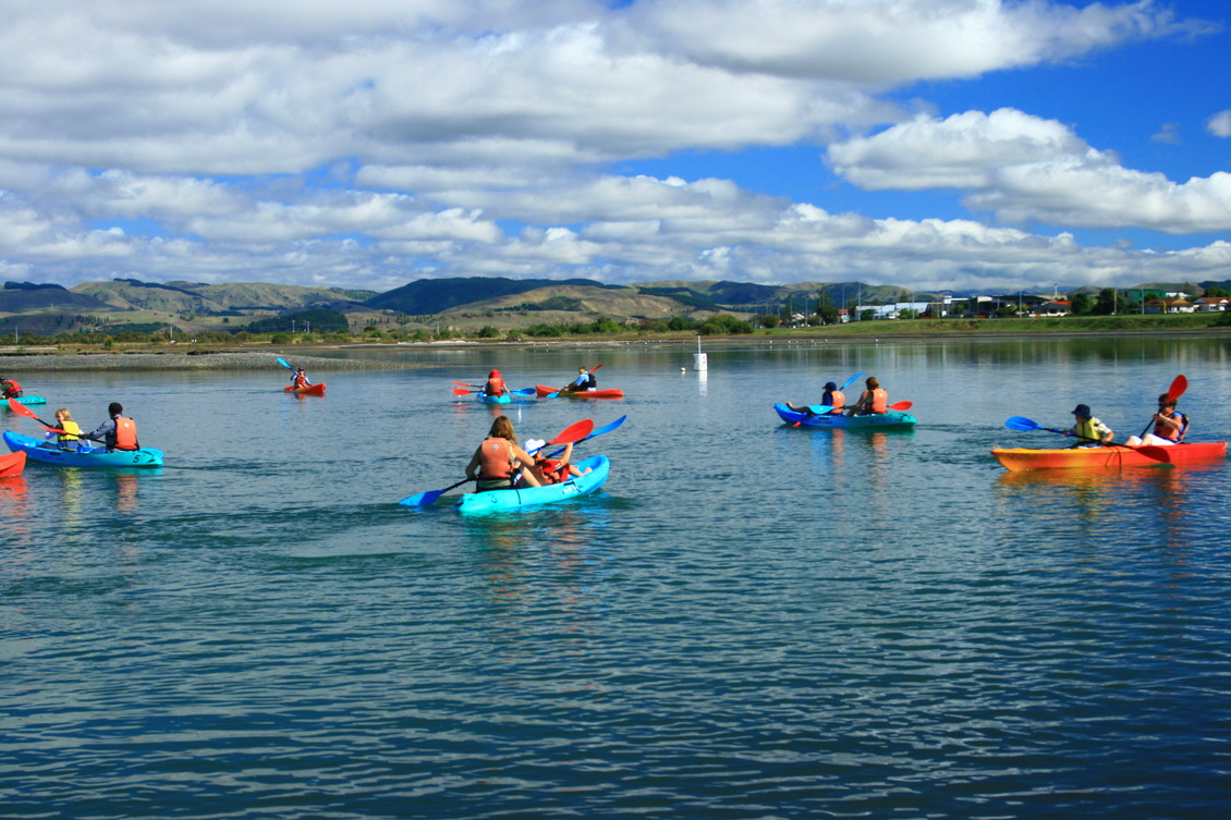 People kayaking on Ahuriri Estuary near Napier, New Zealand