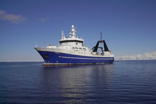 Research vessel (RV) Tangaroa in the Ross Sea, very still ocean