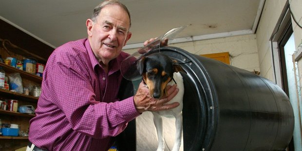 Tony Prentice with dog by kennel prototype