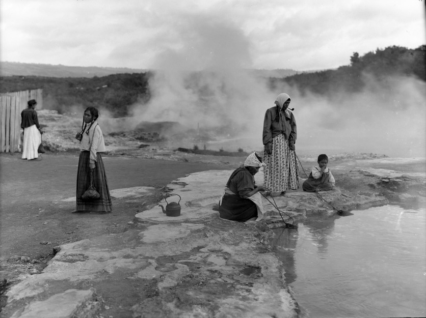 Women preparing food in hot pool, Whakarewarewa, NZ, ca 1910