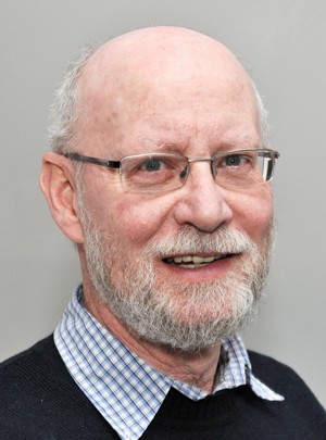 Profile headshot of Dr Alan Beu.