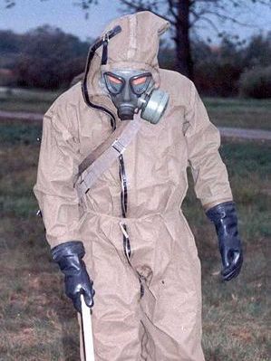 Testing for ground contamination in full hazard suit