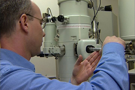 Dr Richard Tilley using an electron microscope.