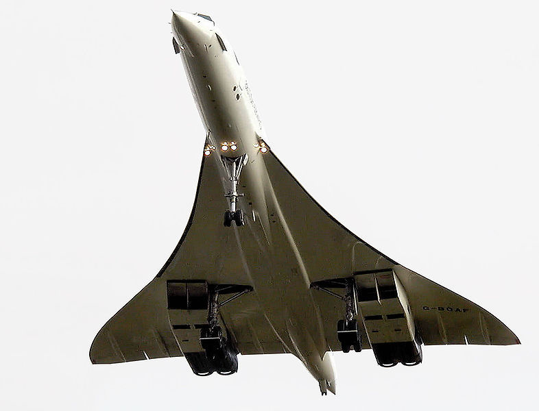 Looking up at a Concorde areophane in the sky.