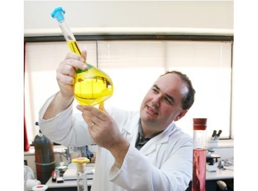 Professor Ashton Partridge working on dye-sensitised solar cells