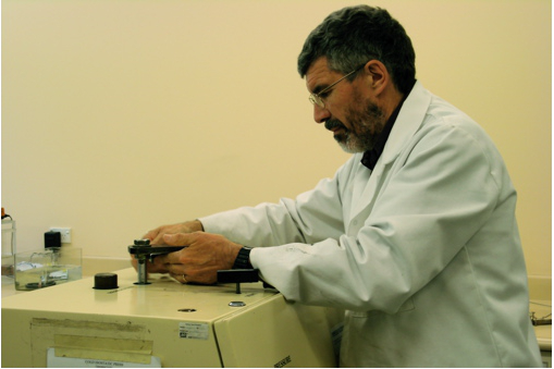 Dr Ian Brown placing O-Sialon samples in the isostatic press