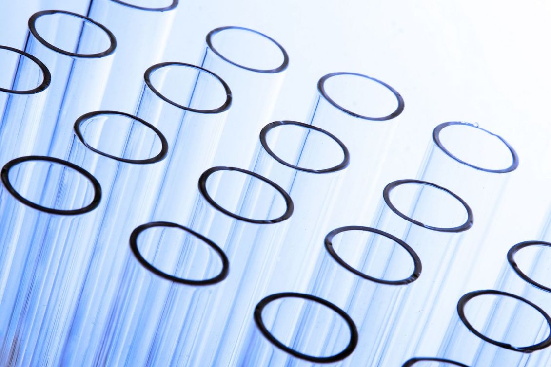 Close up of Laboratory test tubes on a white background.