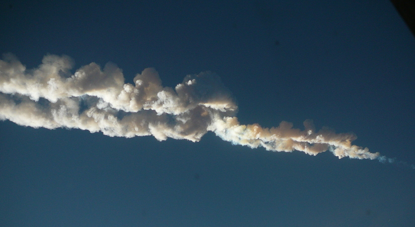 Meteor trace in blue sky over Chelyabinsk, Russia February 2013