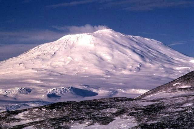 View of Mount Erebus, Ross Island, Antarctica, covered in snow.
