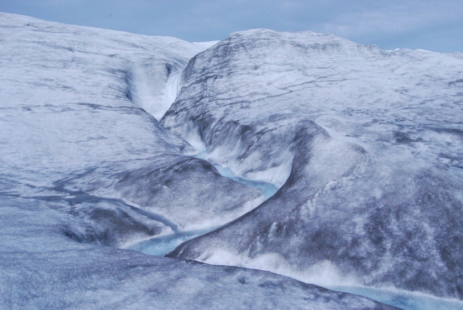Snow cover melted from a low-lying area of Greenland’s ice sheet