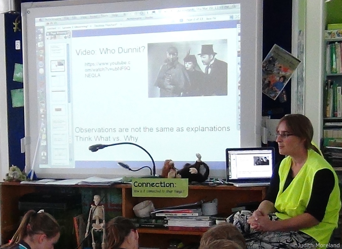 A class using the YouTube video Whodunnit? with thier teacher.