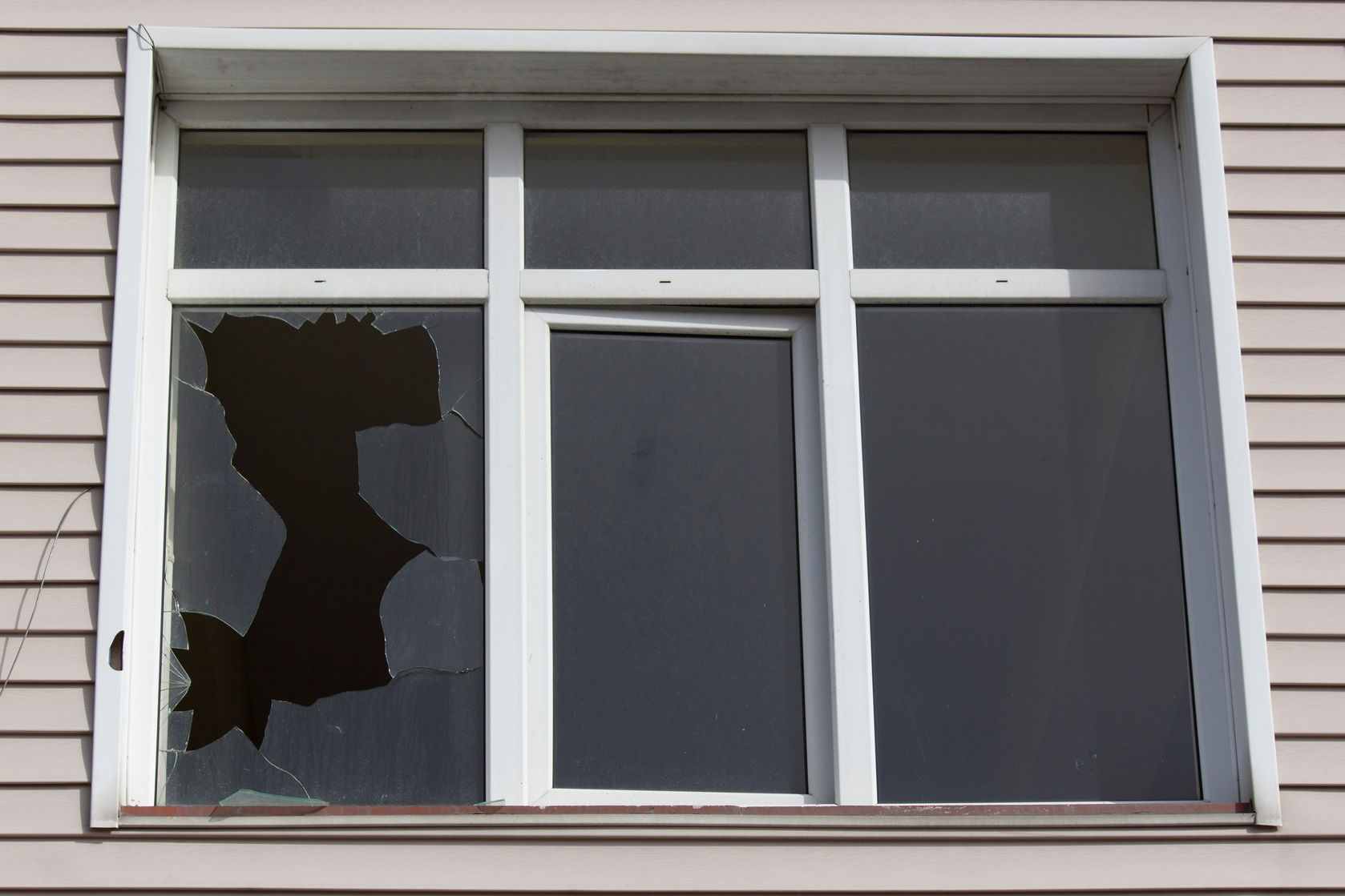 The window was broken with a