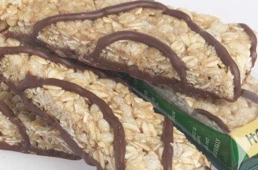 Muesli bars with chocolate drizzled icing.