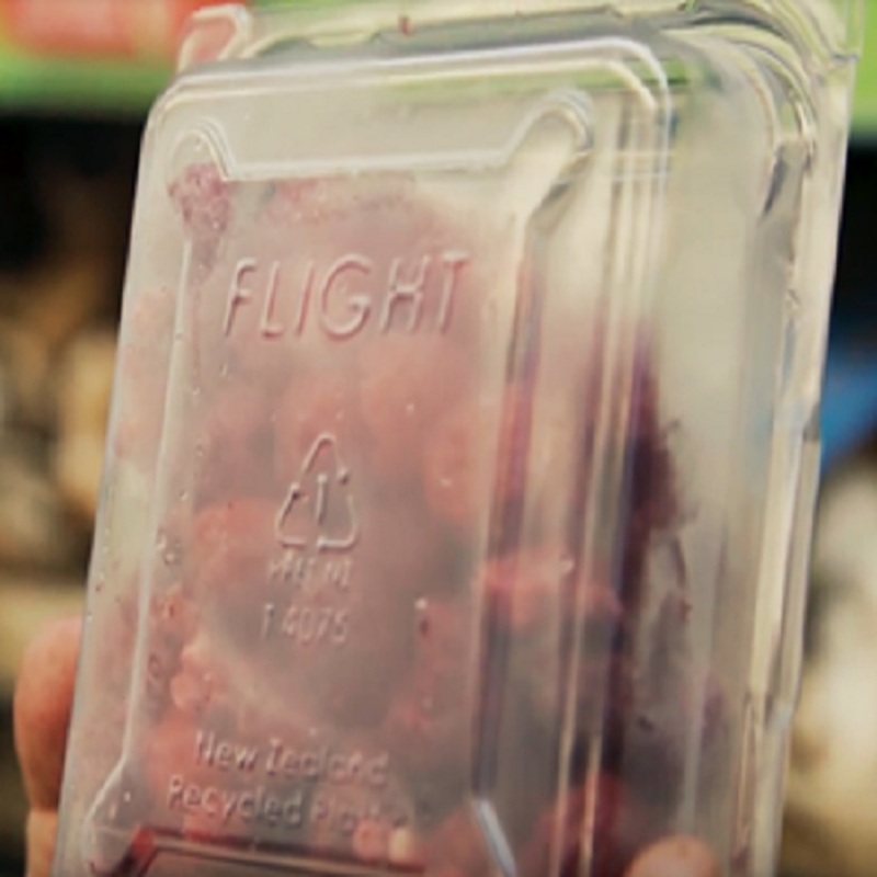Flight stamp on recycled PET plastic packaging. 