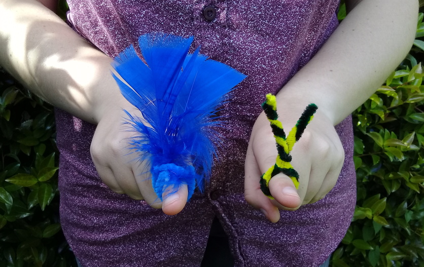 Person with two simple finger puppets.