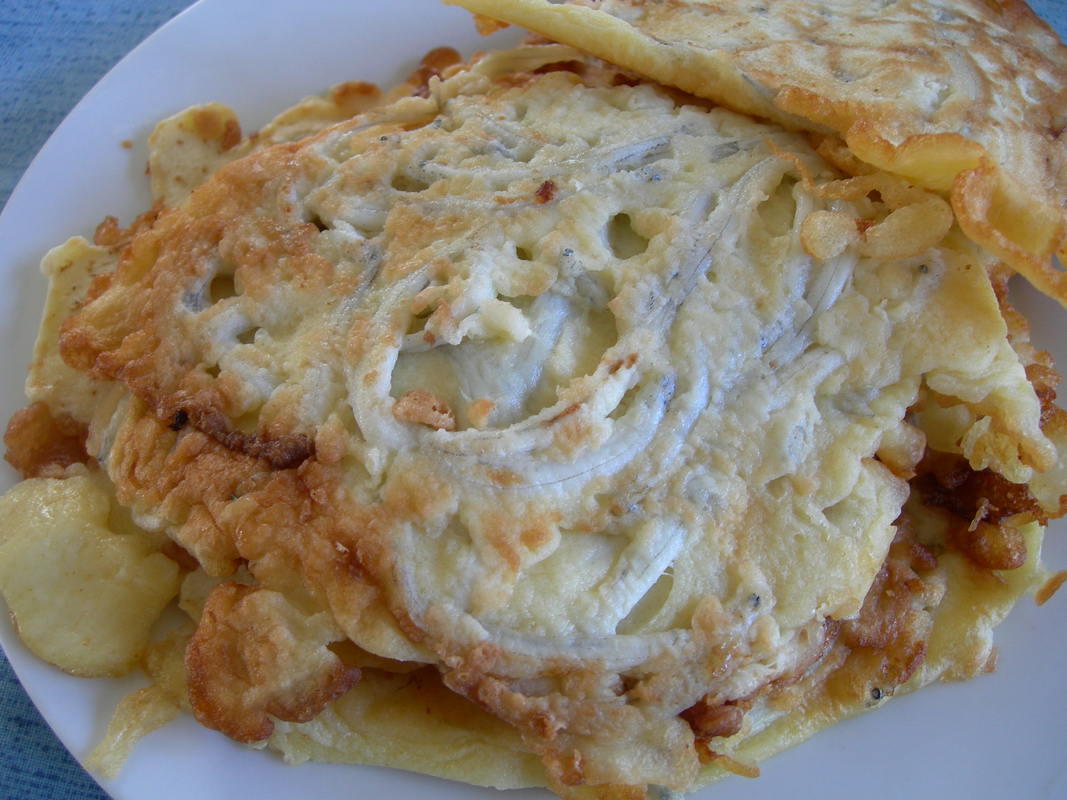 Whitebait galaxiid fritters on a plate
