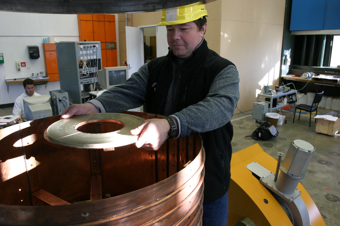 Scientist testing a high-temperature superconducting (HTS) coil