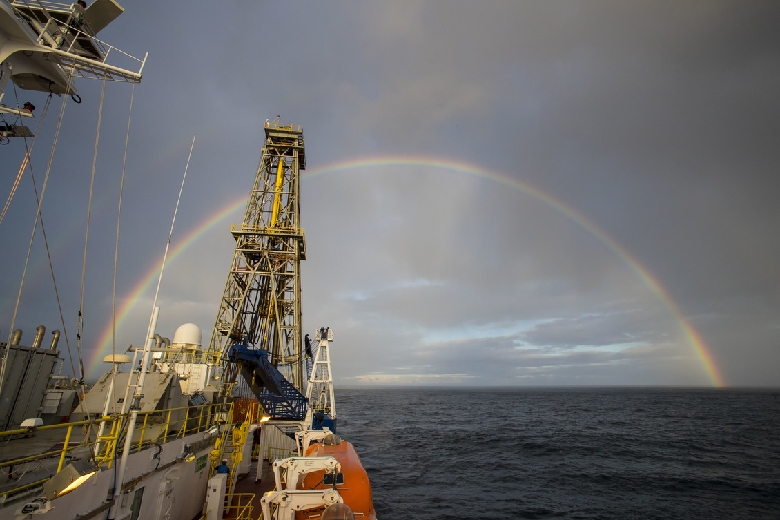 A double rainbow over research ship the JOIDES Resolution.