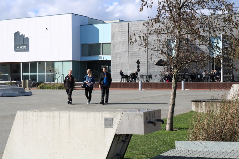 3 people walking in an urban space in Lower Hutt, New Zealand