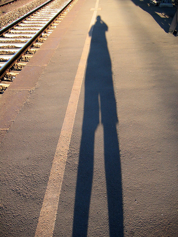 A shadow of a man taken on the central train station in Bingen.
