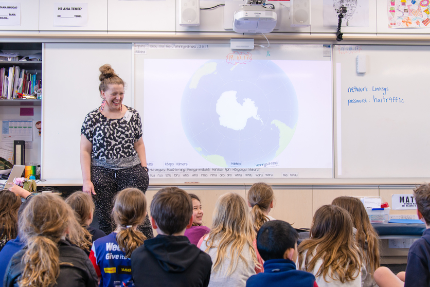 Gabby O’Connor teaching about Antarctica in a classroom.