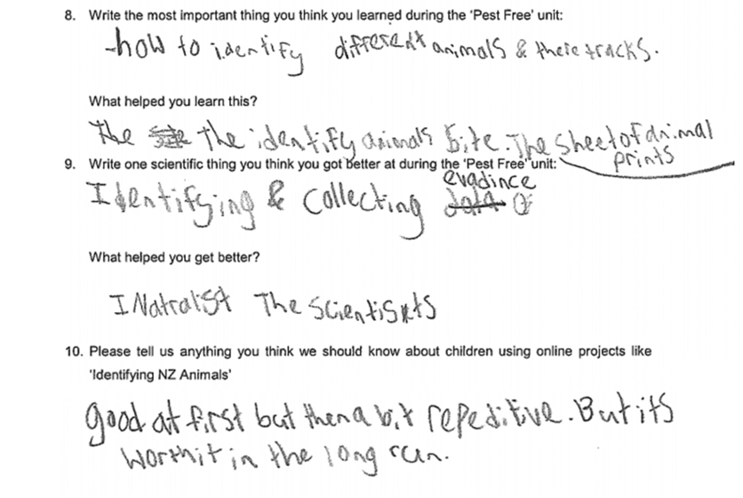 Students writing reflecting on learning from pest free project