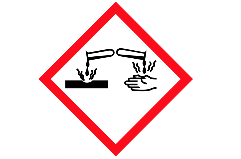 Pictogram warns that a substance is corrosive and can harm.