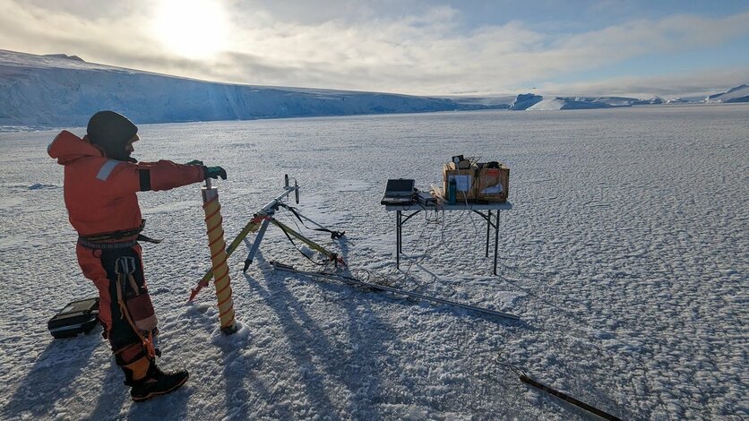 A scientist using radar instruments to study sea ice thickness