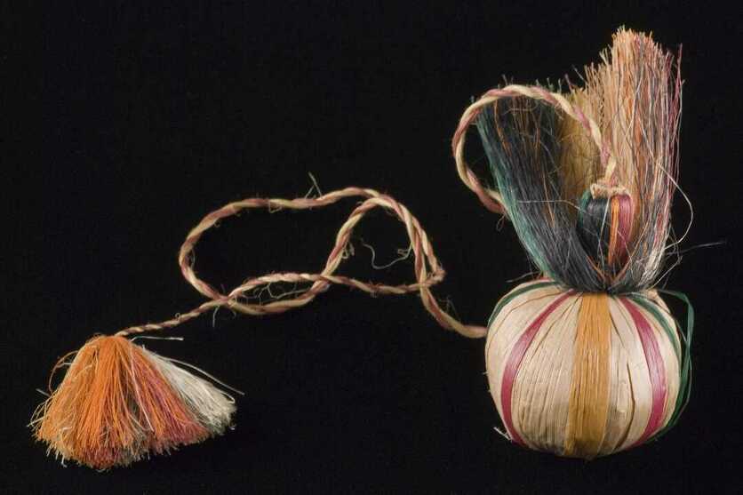 Natural raupō poi with coloured stripes & a long-plaited tassel